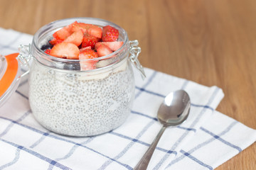 Chia seeds. A delicious healthy breakfast. Diet. Berries and pudding.