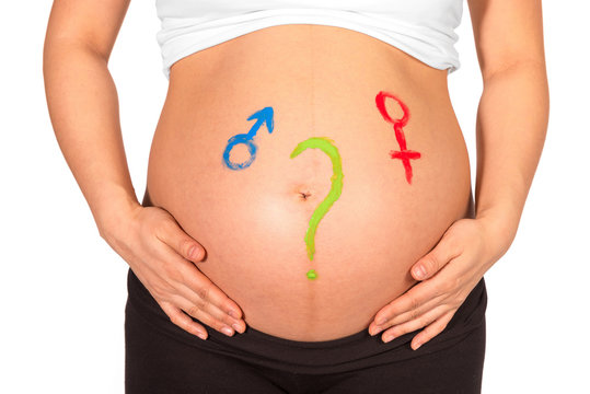 Question mark gender symbols painted on belly of pregnant woman