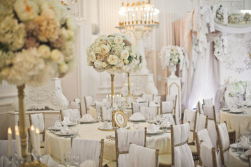 Luxury decorated dinner hall in white and brown tones