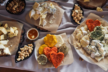 Look from above at table with cheese and other snacks