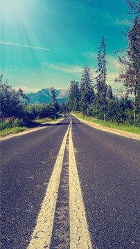 Amazing Mountain Road in Europe. Vertical Photo.