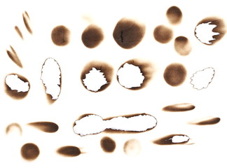 Obraz premium Set of burnt holes of paper, texture and background