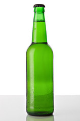 Bottle of beer over a white background 