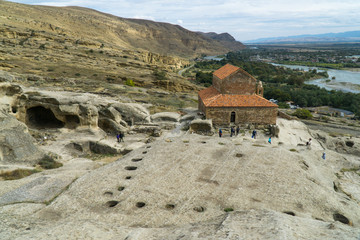 Antique cave city in the rock Upliscihe, Georgia. View of the Church.