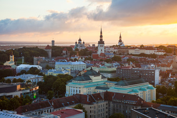 Colorful sunset over towers of old town of Tallinn, Estonia