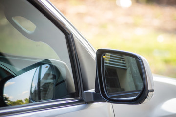 Car side mirror with sunset