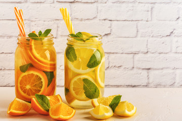 Fototapeta premium Detox fruit infused water. Refreshing summer homemade cocktail.