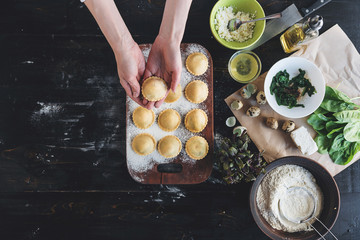 Step by step the chef prepares ravioli with ricotta cheese, yolks quail eggs and spinach with...