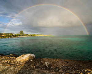 Rainbow over ocean and beach Jamaica