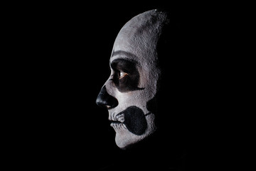 Naklejka premium Beautiful man with creative make-up for the Halloween party