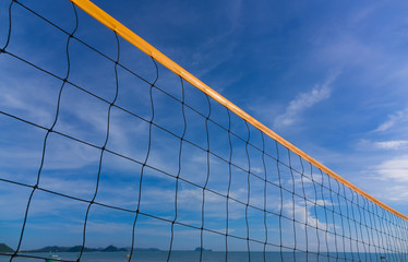 Closeup of Beach volleyball net on the beach with a clear and sunny sky