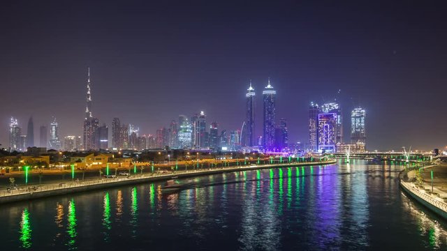 night light dubai city downtown water canal panorama 4k time lapse uae
