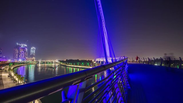 famous dubai water canal night illumination bridge panorama 4k time lapse uae
