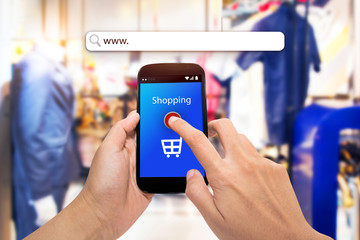 Man use mobile phone with blur store and address bar,Shopping Purchase Order Concept.online shopping background.