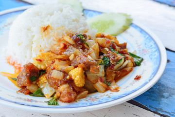 Rice topped with fried pork