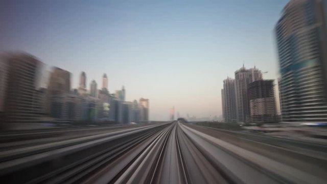 dubai cityscape famous metro line ride sunset panorama 4k time lapse uae
