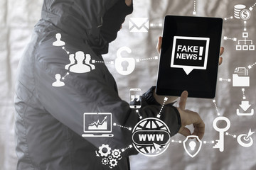Fake Hacking News. HOAX political internet social network. Fabricated false disinformation technology on TV and newspaper. Hacker offers hacked breaking news concept.