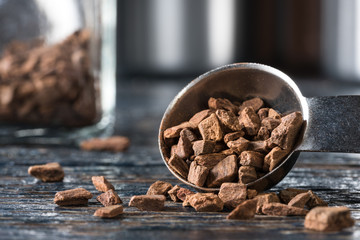 Cinnamon Chips Spilled from a Teaspoon