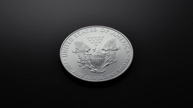close-up shot one dollar silver eagle coin rotating