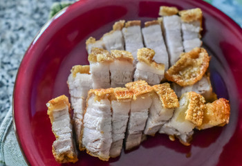 Crispy pork in red dish