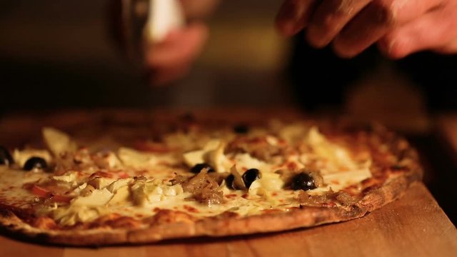 d&eacute;coupe d'une pizza 