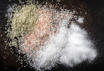 Salt selection as close-up on brown background