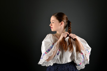 girl in folklore costume