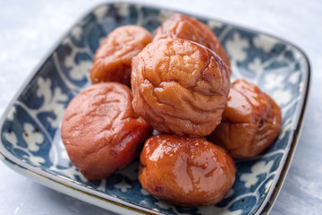 Traditional Japanese Umeboshi as close-up in a bowl