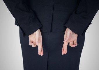 Obraz premium Woman hands with fingers crossed