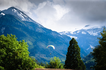 Beautiful landscape with paragliders  in Interlaken, Switzerland