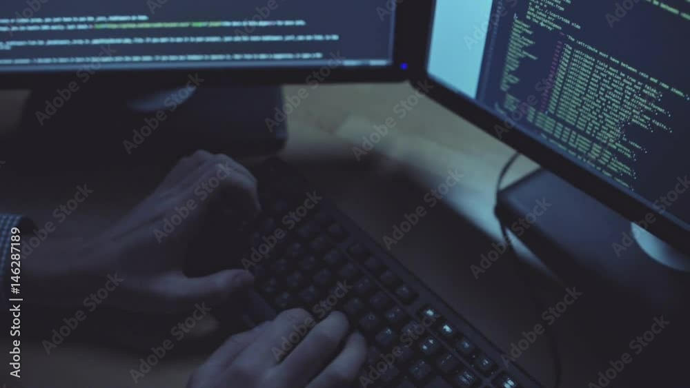 Wall mural diligent programmer writing a code at night