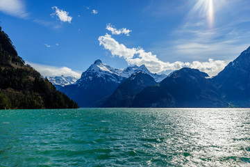 Mountains at lake Lucern and Village Brunnen. View from boot, Switzerland