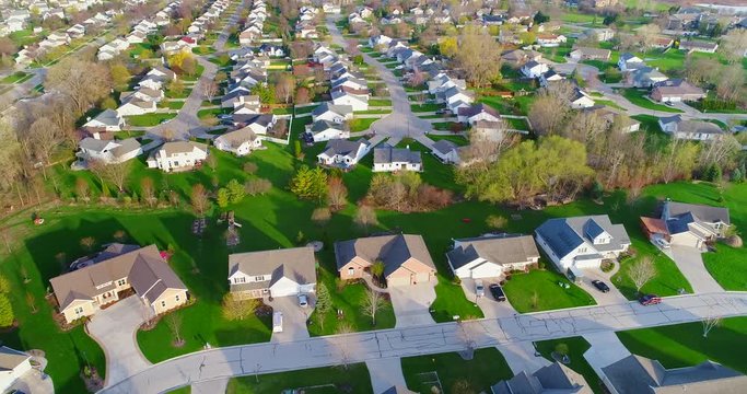 Scenic suburban neighborhood, aerial view early morning in Springtime.

