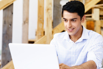 Portrait of young man in office