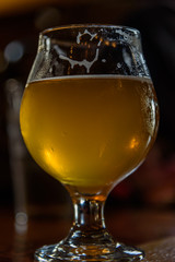 closeup of beautiful glass of IPA craft beer