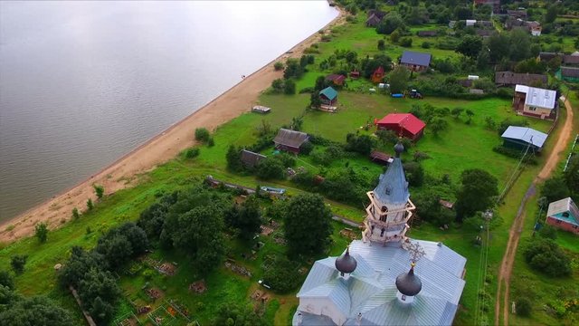Drone flight over the church in the village