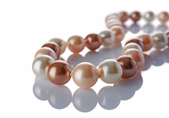 Luxury elegant colored pearl necklace close-up