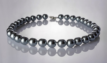 Luxury elegant silver pearl necklace close-up