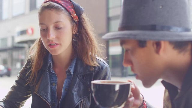 A hipster couple on a coffee date
