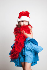 Girl in Santa Claus costume 