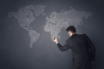 Businessman with world map