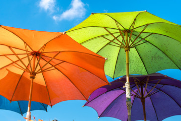 Colorful big umbrellas in the sky. 