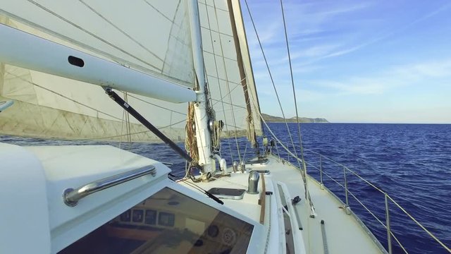 A couple of a man and a woman is talking in the yacht on a sunny day - 4