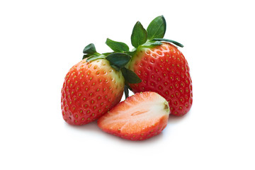 Fresh strawberries close-up on white background.