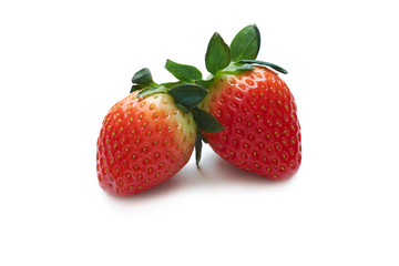 Fresh strawberries close-up on white background.