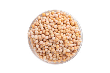 Yellow peas in a bowl view from above  isolated on white backgro