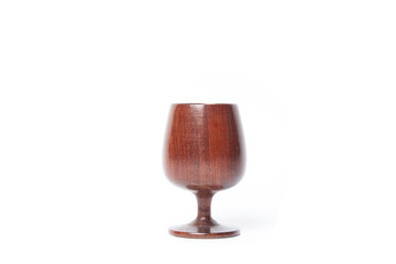 Wine glass made by wood isolated on white background.