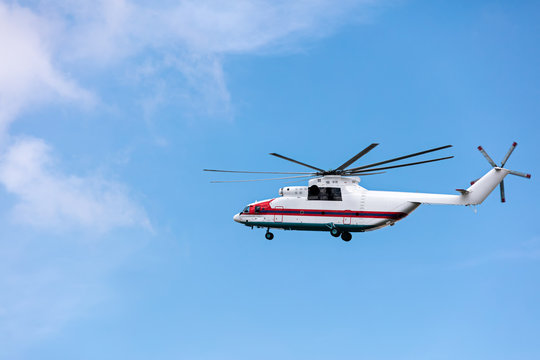heavy cargo helicopter flying against sky