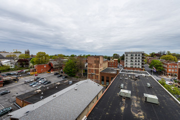 Aerial of historic downtown Lancaster, Pennsylvania with blooming trees