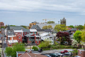 Aerial of historic downtown Lancaster, Pennsylvania with blooming trees